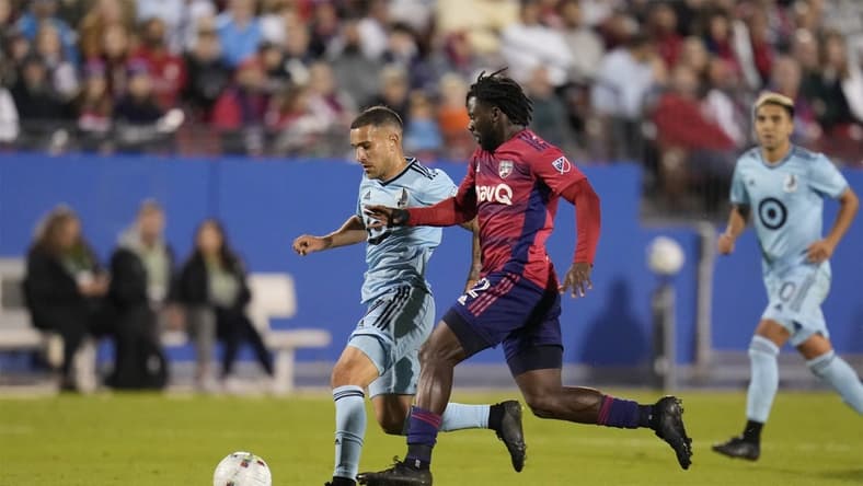 Oct 17, 2022; Frisco, Texas, US; Minnesota United midfielder Franco Fragapane (7) moves the ball defended by FC Dallas midfielder Ema Twumasi (22) in the first half at Toyota Stadium. Mandatory Credit: Chris Jones-USA TODAY Sports