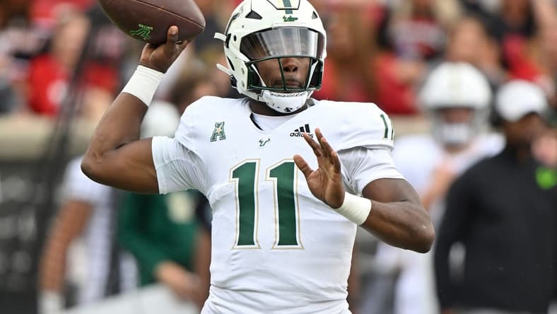 Sep 24, 2022; Louisville, Kentucky, USA; South Florida Bulls quarterback Gerry Bohanon (11) looks to pass against the Louisville Cardinals during the second quarter at Cardinal Stadium. Louisville defeated South Florida 41-3. Mandatory Credit: Jamie Rhodes-USA TODAY Sports