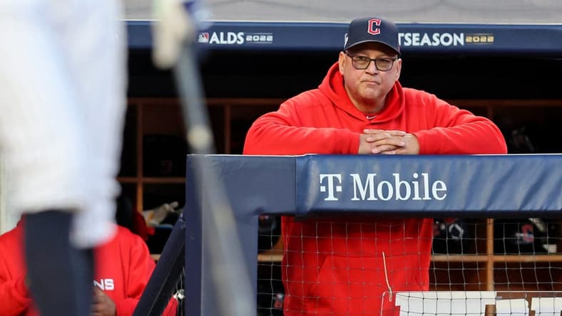 Oct 18, 2022; Bronx, New York, USA; Cleveland Guardians manager Terry Francona (77) watches New York Yankees right fielder Aaron Judge (99) at bat during the fifth inning in game five of the ALDS for the 2022 MLB Playoffs at Yankee Stadium. Mandatory Credit: Brad Penner-USA TODAY Sports