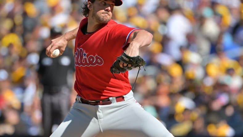 Oct 19, 2022; San Diego, California, USA; Philadelphia Phillies starting pitcher Aaron Nola (27) throws pitch in the first inning against the San Diego Padres during game two of the NLCS for the 2022 MLB Playoffs at Petco Park. Mandatory Credit: Jayne Kamin-Oncea-USA TODAY Sports