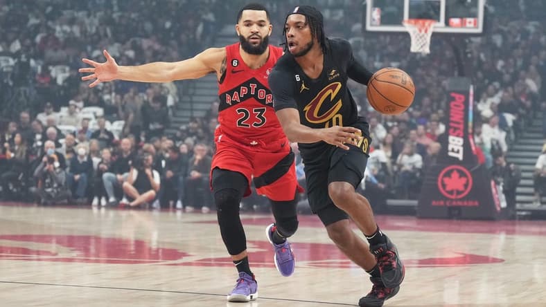 Oct 19, 2022; Toronto, Ontario, CAN; Cleveland Cavaliers guard Darius Garland (10) controls the ball as Toronto Raptors guard Fred VanVleet (23) tries to defend during the first quarter at Scotiabank Arena. Mandatory Credit: Nick Turchiaro-USA TODAY Sports