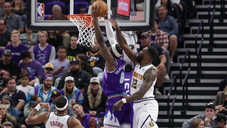 Oct 19, 2022; Salt Lake City, Utah, USA; Utah Jazz forward Jarred Vanderbilt (8) gets past Denver Nuggets forward Jeff Green (32) and goes to the basket during the second quarter at Vivint Arena. Mandatory Credit: Chris Nicoll-USA TODAY Sports