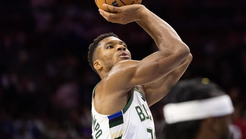 Oct 20, 2022; Philadelphia, Pennsylvania, USA; Milwaukee Bucks forward Giannis Antetokounmpo (34) attempts a foul shot against the Philadelphia 76ers during the fourth quarter at Wells Fargo Center. Mandatory Credit: Bill Streicher-USA TODAY Sports