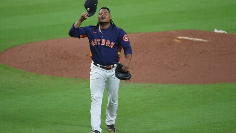 Oct 20, 2022; Houston, Texas, USA; Houston Astros starting pitcher Framber Valdez (59) reacts after completing the seventh inning against the New York Yankees during game two of the ALCS for the 2022 MLB Playoffs at Minute Maid Park. Mandatory Credit: Erik Williams-USA TODAY Sports