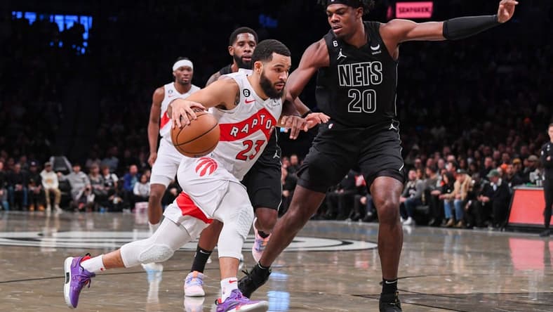 Oct 21, 2022; Brooklyn, New York, USA; Toronto Raptors guard Fred VanVleet (23) drives to the basket on Brooklyn Nets center Day'Ron Sharpe (20) during the first quarter at Barclays Center. Mandatory Credit: Dennis Schneidler-USA TODAY Sports