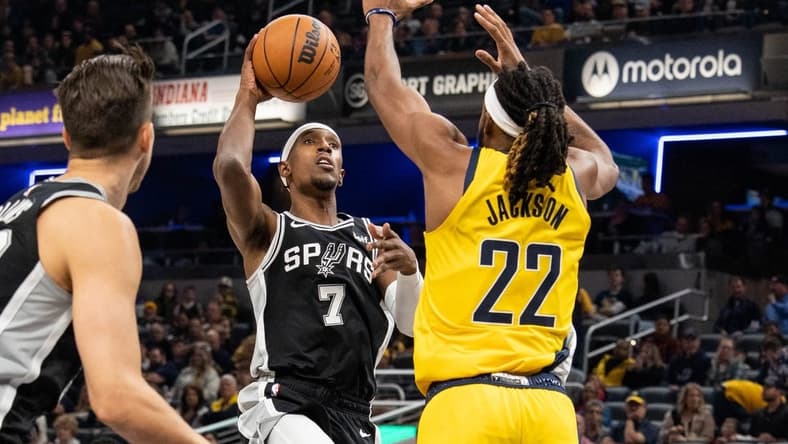 Oct 21, 2022; Indianapolis, Indiana, USA; San Antonio Spurs guard Josh Richardson (7) shoots the ball while Indiana Pacers forward Isaiah Jackson (22) defends in the first half at Gainbridge Fieldhouse. Mandatory Credit: Trevor Ruszkowski-USA TODAY Sports
