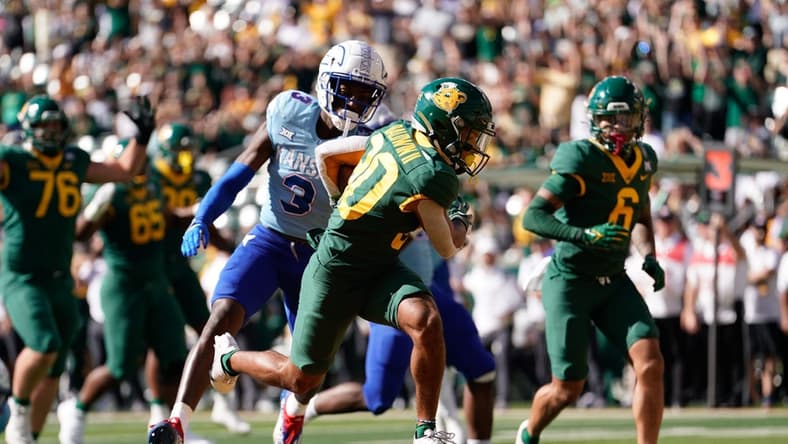 Oct 22, 2022; Waco, Texas, USA;  Baylor Bears wide receiver Monaray Baldwin (80) scores a touchdown in the first half against the Kansas Jayhawks at McLane Stadium. Mandatory Credit: Chris Jones-USA TODAY Sports
