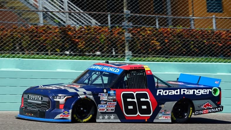 Oct 22, 2022; Homestead, Florida, USA; Camping World Truck Series driver Ty Majeski (66) races on the final lap winning the Baptist Health 200 at Homestead-Miami Speedway. Mandatory Credit: John David Mercer-USA TODAY Sports