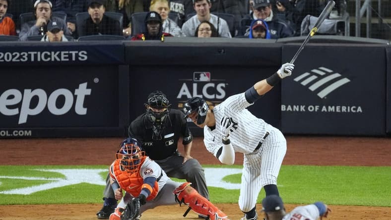 Oct 22, 2022; Bronx, New York, USA; New York Yankees right fielder Aaron Judge (99) strikes out in the sixth inning against the Houston Astros during game three of the ALCS for the 2022 MLB Playoffs at Yankee Stadium. Mandatory Credit: Robert Deutsch-USA TODAY Sports