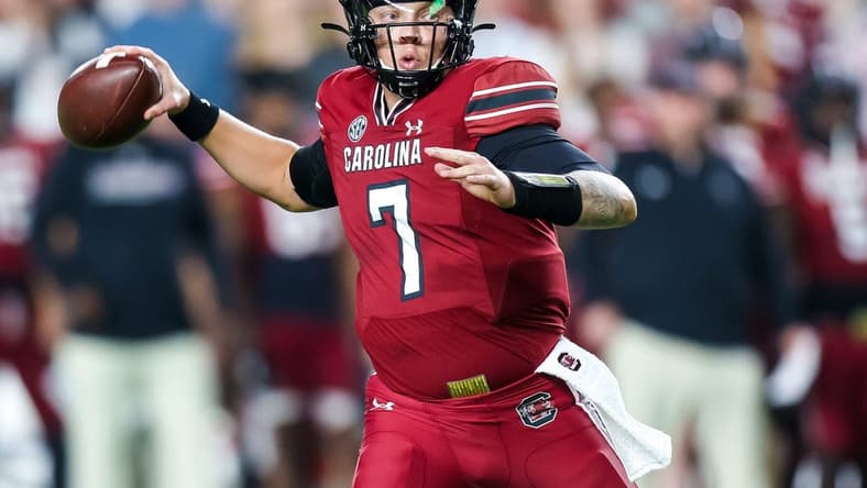 Oct 22, 2022; Columbia, South Carolina, USA; South Carolina Gamecocks quarterback Spencer Rattler (7) passes against the Texas A&M Aggies in the first quarter at Williams-Brice Stadium. Mandatory Credit: Jeff Blake-USA TODAY Sports