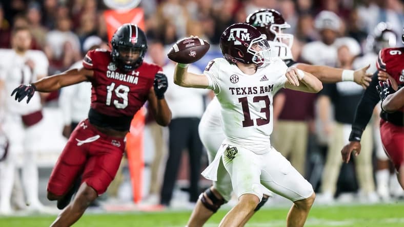 Oct 22, 2022; Columbia, South Carolina, USA; Texas A&M Aggies quarterback Haynes King (13) passes against the South Carolina Gamecocks in the second quarter at Williams-Brice Stadium. Mandatory Credit: Jeff Blake-USA TODAY Sports