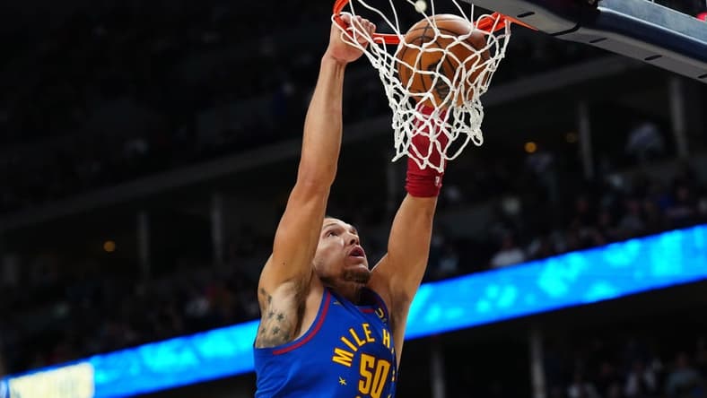 Oct 22, 2022; Denver, Colorado, USA; Denver Nuggets forward Aaron Gordon (50) dunks in the second quarter against the Oklahoma City Thunder at Ball Arena. Mandatory Credit: Ron Chenoy-USA TODAY Sports