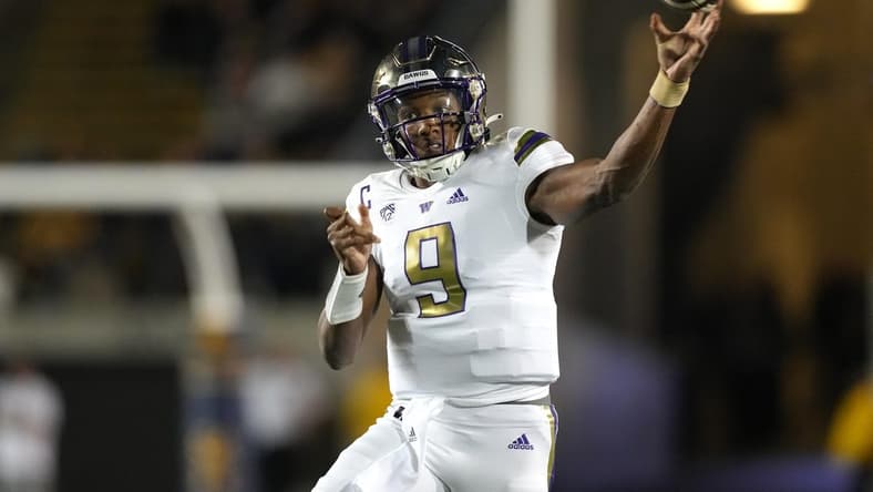 Oct 22, 2022; Berkeley, California, USA; Washington Huskies quarterback Michael Penix Jr. (9) throws a pass against the California Golden Bears during the first quarter at FTX Field at California Memorial Stadium. Mandatory Credit: Darren Yamashita-USA TODAY Sports