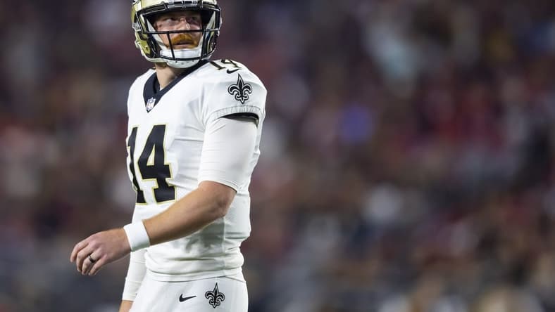 Oct 20, 2022; Glendale, Arizona, USA; New Orleans Saints quarterback Andy Dalton (14) against the Arizona Cardinals at State Farm Stadium. Mandatory Credit: Mark J. Rebilas-USA TODAY Sports