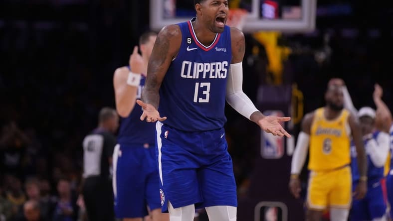 Oct 20, 2022; Los Angeles, California, USA; LA Clippers guard Paul George (13) reacts in the second half against the Los Angeles Lakers at Crypto.com Arena. The Clippers defeated the Lakers 103-97. Mandatory Credit: Kirby Lee-USA TODAY Sports