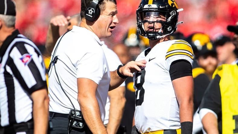 Iowa offensive coordinator and quarterbacks coach Brian Ferentz talks with QB Alex Padilla during the game against Ohio State.

Syndication Hawkcentral
