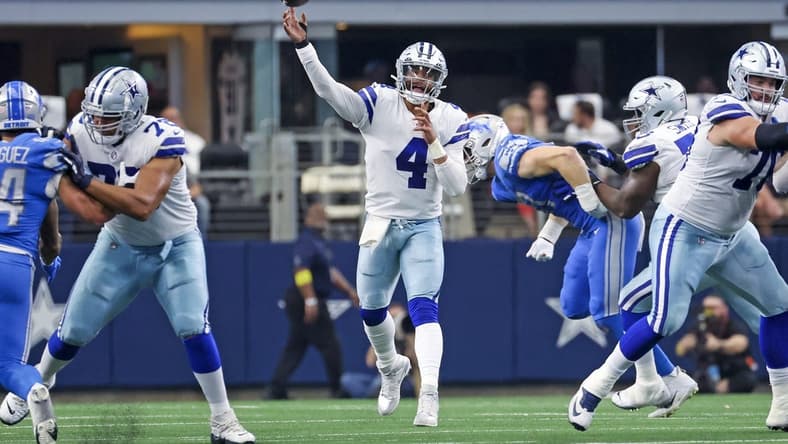 Oct 23, 2022; Arlington, Texas, USA;  Dallas Cowboys quarterback Dak Prescott (4) throws during the first half against the Detroit Lions at AT&T Stadium. Mandatory Credit: Kevin Jairaj-USA TODAY Sports
