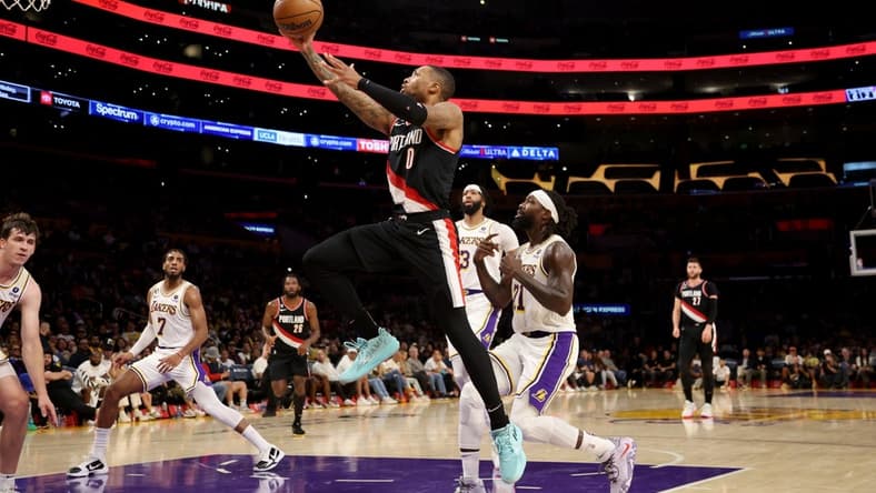 Oct 23, 2022; Los Angeles, California, USA;  Portland Trail Blazers guard Damian Lillard (0) goes to the basket during the second quarter against the Los Angeles Lakers at Crypto.com Arena. Mandatory Credit: Kiyoshi Mio-USA TODAY Sports