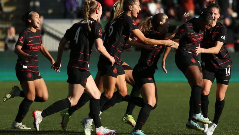 Oct 23, 2022; Portland, Oregon, USA; The Portland Thorns FC celebrate the win over San Diego Wave FC during the semifinals of the 2022 NWSL Playoffs at Providence Park. Mandatory Credit: Craig Mitchelldyer-USA TODAY Sports