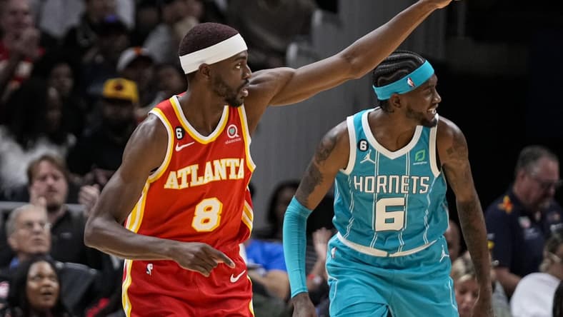 Oct 23, 2022; Atlanta, Georgia, USA; Atlanta Hawks guard Justin Holiday (8) reacts after a basket against the Charlotte Hornets during the second half at State Farm Arena. Mandatory Credit: Dale Zanine-USA TODAY Sports
