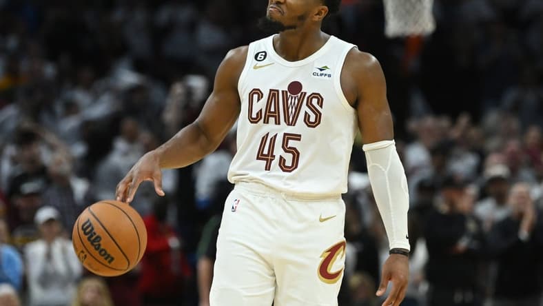 Oct 23, 2022; Cleveland, Ohio, USA; Cleveland Cavaliers guard Donovan Mitchell (45) holds the ball as time expires during overtime against the Washington Wizards at Rocket Mortgage FieldHouse. Mandatory Credit: Ken Blaze-USA TODAY Sports