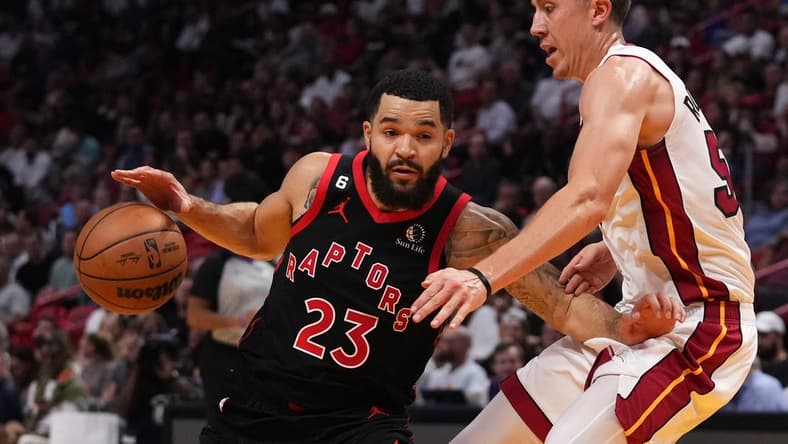 Oct 24, 2022; Miami, Florida, USA; Toronto Raptors guard Fred VanVleet (23) drives the ball around Miami Heat guard Duncan Robinson (55) during the first half at FTX Arena. Mandatory Credit: Jasen Vinlove-USA TODAY Sports