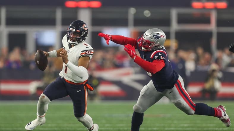 Oct 24, 2022; Foxborough, Massachusetts, USA; New England Patriots outside linebacker Matt Judon (9) chase down Chicago Bears quarterback Justin Fields (1) during the first half at Gillette Stadium. Mandatory Credit: Paul Rutherford-USA TODAY Sports