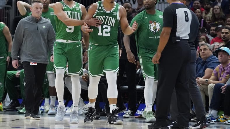 Oct 24, 2022; Chicago, Illinois, USA; Boston Celtics forward Grant Williams (12) reacts after being thrown out for getting his second technical foul of the game against the Chicago Bulls during the second half at United Center. Mandatory Credit: David Banks-USA TODAY Sports