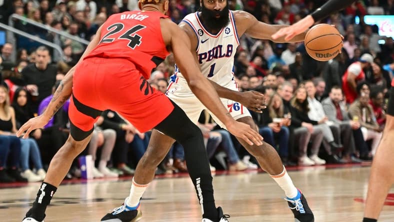 Oct 26, 2022; Toronto, Ontario, CAN; Philadelphia 76ers guard James Harden (1) dribbles the ball in front of Toronto Raptors center Khem Birch (24) in the first half at Scotiabank Arena. Mandatory Credit: Dan Hamilton-USA TODAY Sports