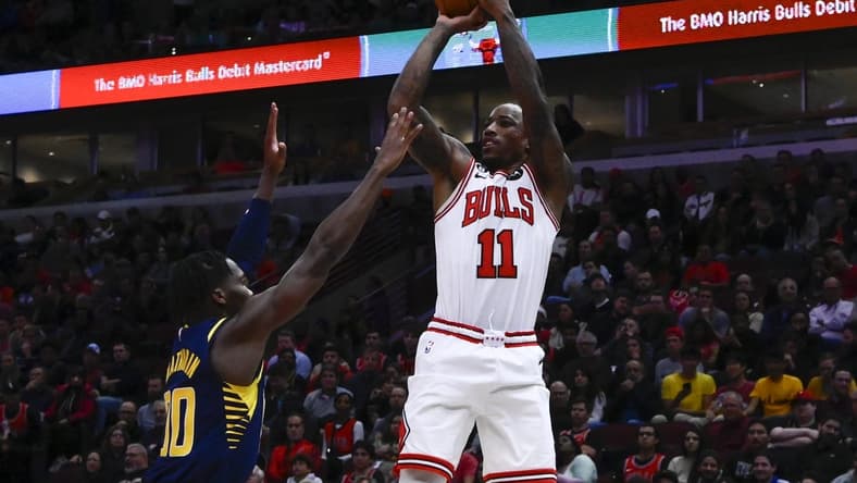 Oct 26, 2022; Chicago, Illinois, USA; Chicago Bulls forward DeMar DeRozan (11) shoots the ball over Indiana Pacers guard Bennedict Mathurin (00) during the first half at the  United Center. Mandatory Credit: Matt Marton-USA TODAY Sports