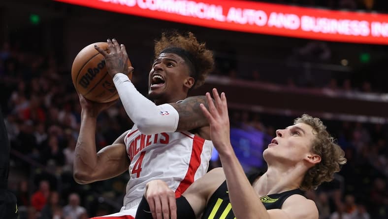 Oct 26, 2022; Salt Lake City, Utah, USA; Houston Rockets guard Jalen Green (4) drives with the ball against Utah Jazz forward Lauri Markkanen (23) in the first quarter at Vivint Arena. Mandatory Credit: Rob Gray-USA TODAY Sports