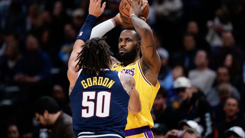 Oct 26, 2022; Denver, Colorado, USA; Los Angeles Lakers forward LeBron James (6) controls the ball as Denver Nuggets forward Aaron Gordon (50) guards in the first quarter at Ball Arena. Mandatory Credit: Isaiah J. Downing-USA TODAY Sports