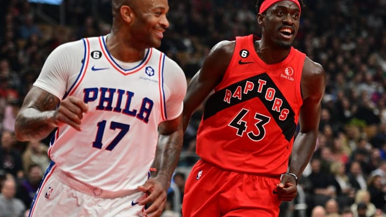 Oct 26, 2022; Toronto, Ontario, CAN; Toronto Raptors forward Pascal Siakam (43) talks to Philadelphia 76ers forward P.J. Tucker (17) after making a basket in the first half at Scotiabank Arena. Mandatory Credit: Dan Hamilton-USA TODAY Sports