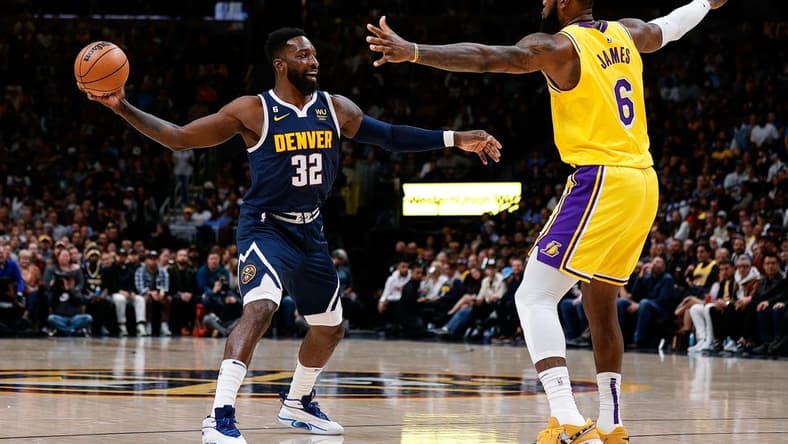 Oct 26, 2022; Denver, Colorado, USA; Denver Nuggets forward Jeff Green (32) controls the ball as Los Angeles Lakers forward LeBron James (6) guards in the fourth quarter at Ball Arena. Mandatory Credit: Isaiah J. Downing-USA TODAY Sports