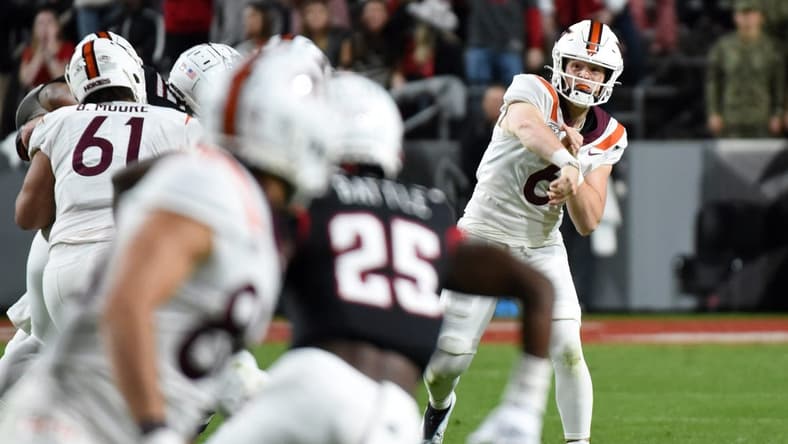Oct 27, 2022; Raleigh, North Carolina, USA; Virginia Tech Hokies quarterback Grant Wells (6) throws a pass during the first half against the North Carolina State Wolfpack at Carter-Finley Stadium. Mandatory Credit: Rob Kinnan-USA TODAY Sports