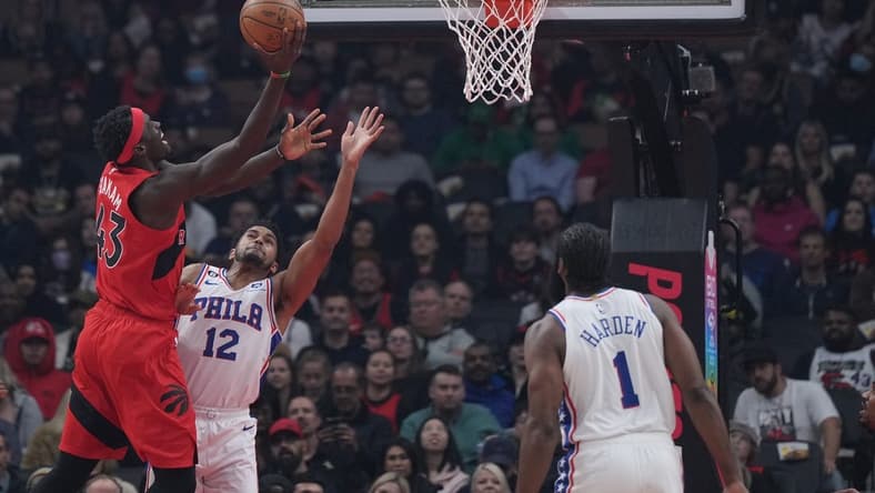 Oct 28, 2022; Toronto, Ontario, CAN; Toronto Raptors forward Pascal Siakam (43) moves to the basket against Philadelphia 76ers forward Tobias Harris (12) during the first quarter at Scotiabank Arena against the Toronto Raptors. Mandatory Credit: Nick Turchiaro-USA TODAY Sports