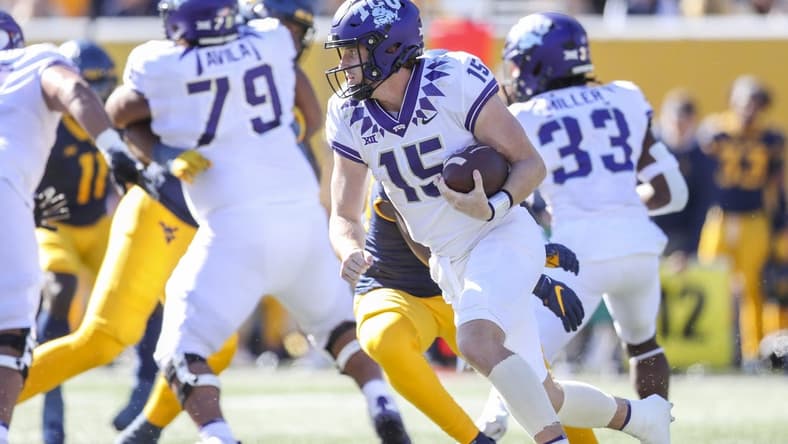 Oct 29, 2022; Morgantown, West Virginia, USA; TCU Horned Frogs quarterback Max Duggan (15) runs the ball during the first quarter against the West Virginia Mountaineers at Mountaineer Field at Milan Puskar Stadium. Mandatory Credit: Ben Queen-USA TODAY Sports