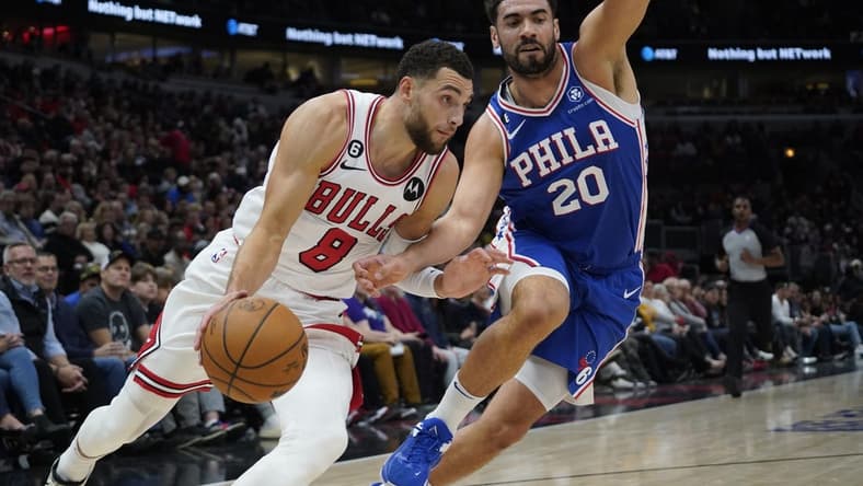 Oct 29, 2022; Chicago, Illinois, USA; Chicago Bulls guard Zach LaVine (8) drives to the basket against Philadelphia 76ers forward Georges Niang (20) during the first half at United Center. Mandatory Credit: David Banks-USA TODAY Sports
