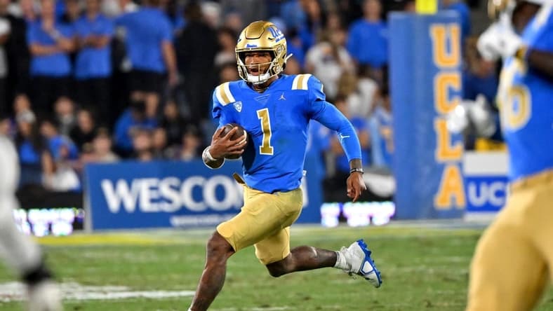 Oct 29, 2022; Pasadena, California, USA;  UCLA Bruins quarterback Dorian Thompson-Robinson (1) runs against the Stanford Cardina in the first half at the Rose Bowl. Mandatory Credit: Jayne Kamin-Oncea-USA TODAY Sports