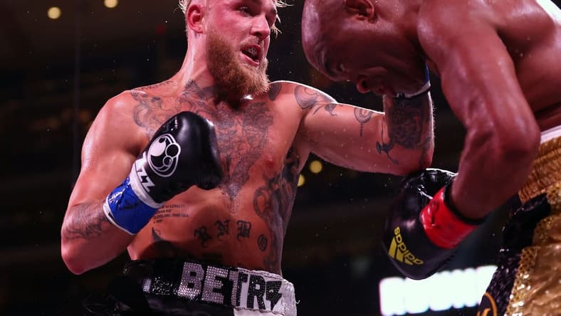 Oct 29, 2022; Glendale, Arizona, USA;  Jake Paul lands a hit against Anderson Silva at Desert Diamond Arena. Mandatory Credit: Mark J. Rebilas-USA TODAY Sports