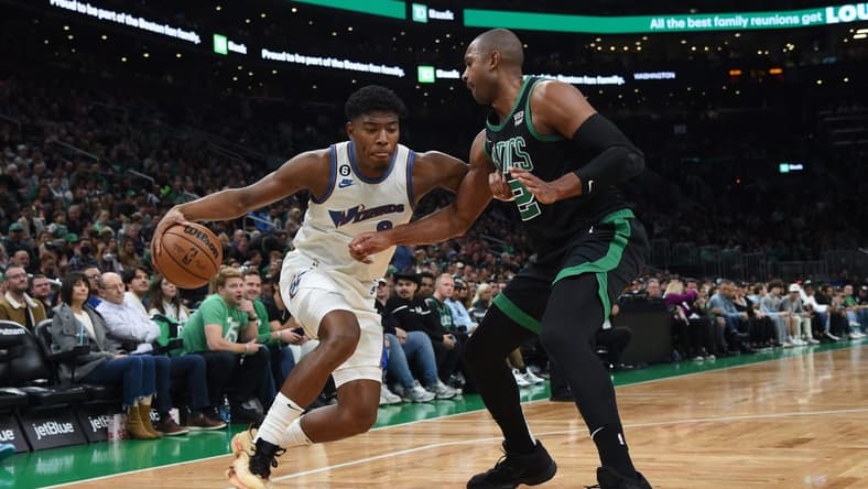 Oct 30, 2022; Boston, Massachusetts, USA; Washington Wizards forward Rui Hachimura (8) controls the ball while Boston Celtics center Al Horford (42) defends during the first half at TD Garden. Mandatory Credit: Bob DeChiara-USA TODAY Sports