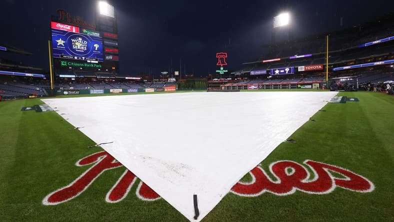 Oct 31, 2022; Philadelphia, PA, USA; The rain tarp on the field before game three of the 2022 World Series between the Philadelphia Phillies and the Houston Astros at Citizens Bank Park. Mandatory Credit: Bill Streicher-USA TODAY Sports