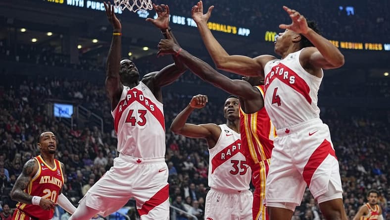 Oct 31, 2022; Toronto, Ontario, CAN; Toronto Raptors forward Pascal Siakam (43) and forward Scottie Barnes (4) go after a rebound against the Atlanta Hawks during the first quarter at Scotiabank Arena. Mandatory Credit: John E. Sokolowski-USA TODAY Sports