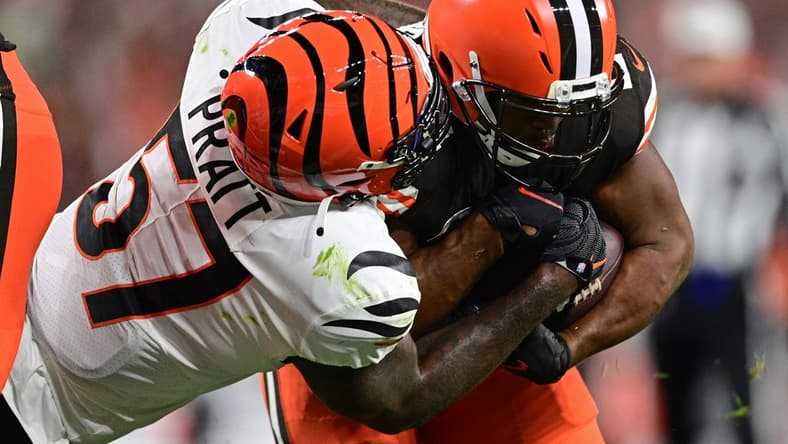 Oct 31, 2022; Cleveland, Ohio, USA; Cleveland Browns running back Nick Chubb (24) runs through Cincinnati Bengals linebacker Germaine Pratt (57) to score a two-point conversion in the second quarter at FirstEnergy Stadium. Mandatory Credit: David Dermer-USA TODAY Sports