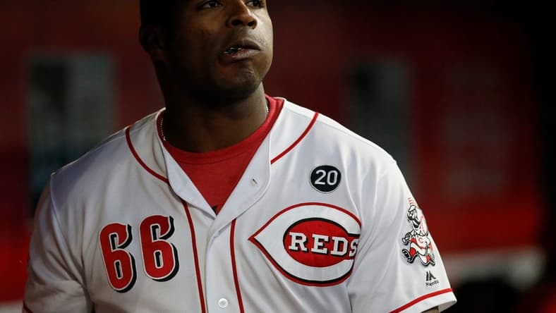 Cincinnati Reds right fielder Yasiel Puig (66) throws a handful of sunflower seeds into his mouth in the seventh inning of the MLB National League game between the Cincinnati Reds and the Chicago Cubs at Great American Ball Park in downtown Cincinnati on Tuesday, May 14, 2019. The Cubs took the first game of the series, 3-1.
Chicago Cubs At Cincinnati Reds
