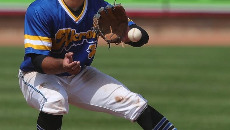 Akron second baseman Jose Fermin (1) fields a ball in the fifth inning at Canal Park on May 23, 2021, in Akron, Ohio.