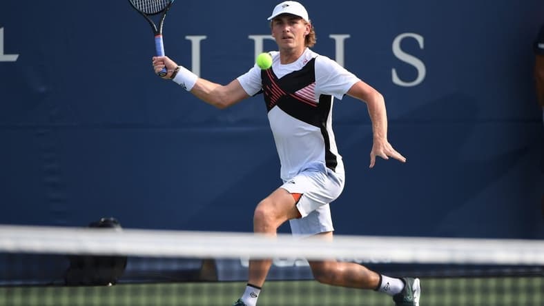 Aug 7, 2021; Toronto, Ontario, Canada; Max Purcell of Australia plays a shot against Emilio Gomez of Ecuador in first round qualifying play for the National Bank Open at the Aviva Centre. Mandatory Credit: Dan Hamilton-USA TODAY Sports