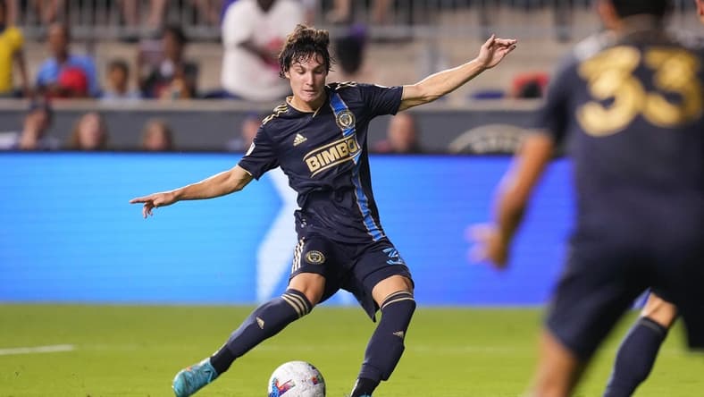 Jul 8, 2022; Chester, Pennsylvania, USA; Philadelphia Union midfielder Paxten Aaronson (30) shoots the ball against D.C. United at Subaru Park. Mandatory Credit: Mitchell Leff-USA TODAY Sports