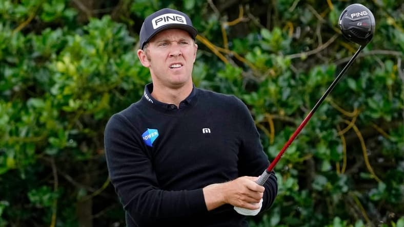 Jul 14, 2022; St. Andrews, SCT; Seamus Power tees off on the third hole during the first round of the 150th Open Championship golf tournament at St. Andrews Old Course. Mandatory Credit: Michael Madrid-USA TODAY Sports