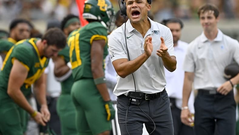 Sep 3, 2022; Waco, Texas, USA; Baylor Bears head coach Dave Aranda cheers for this team during the first quarter against the Albany Great Danes at McLane Stadium. Mandatory Credit: Jerome Miron-USA TODAY Sports